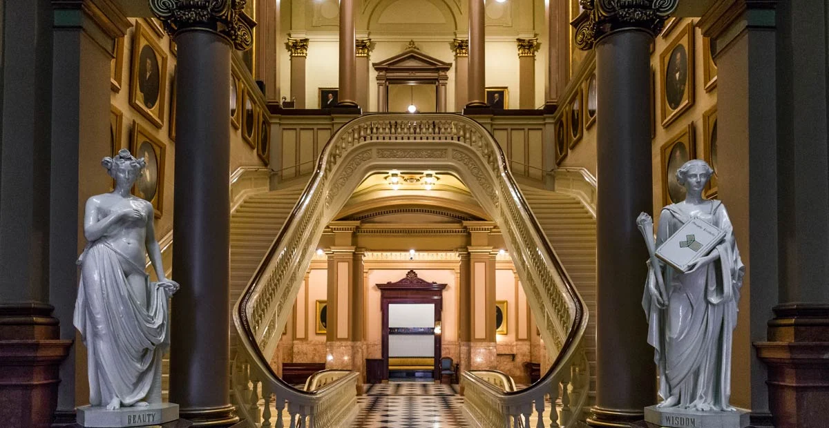 ONE-museum-weddings Hallway with statues and staircases on either side