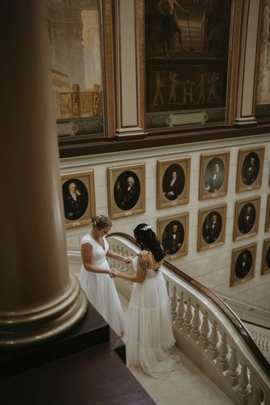 1 (11) Brides holding hands on balcony