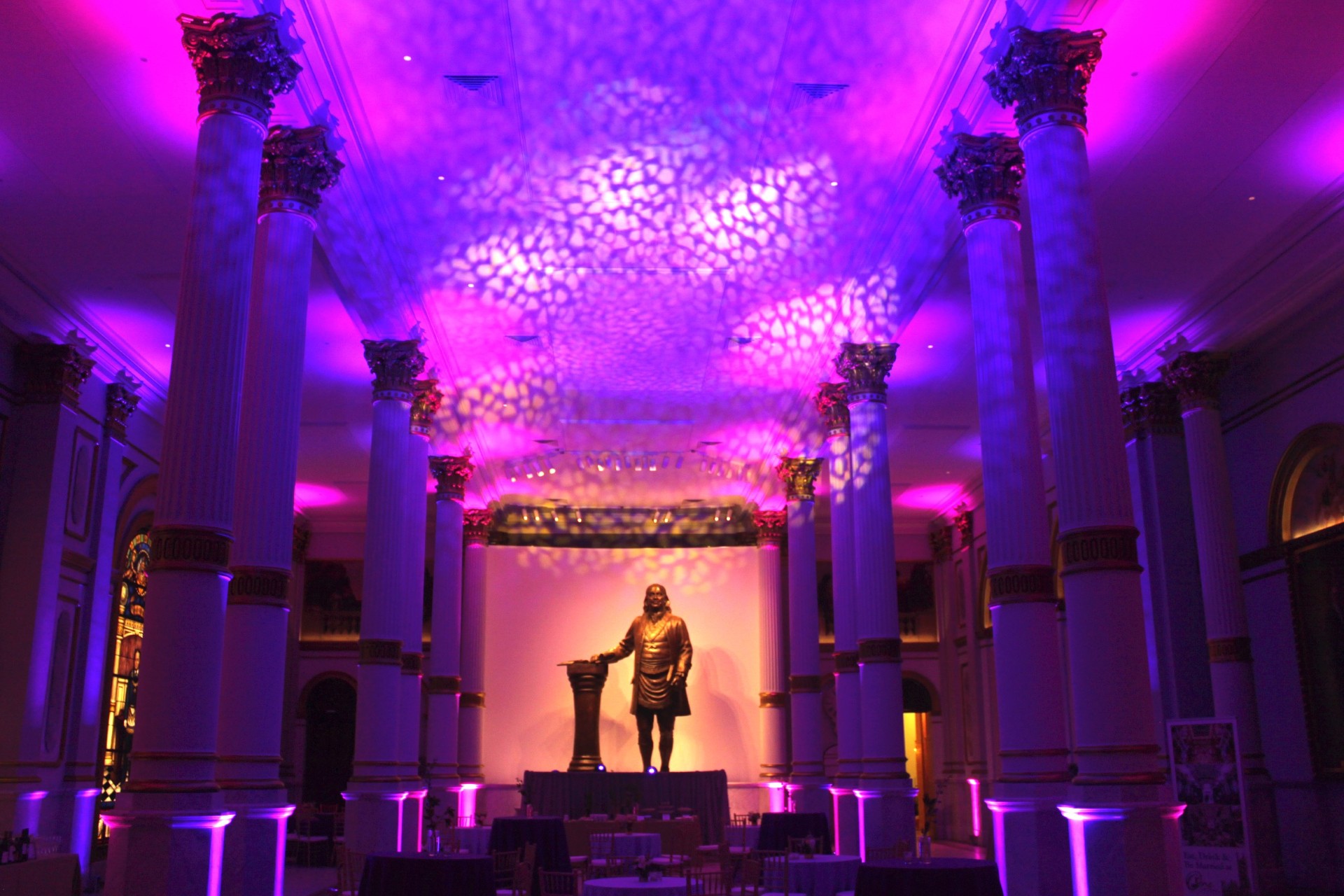 Ballroom ceiling with pink and purple lighting