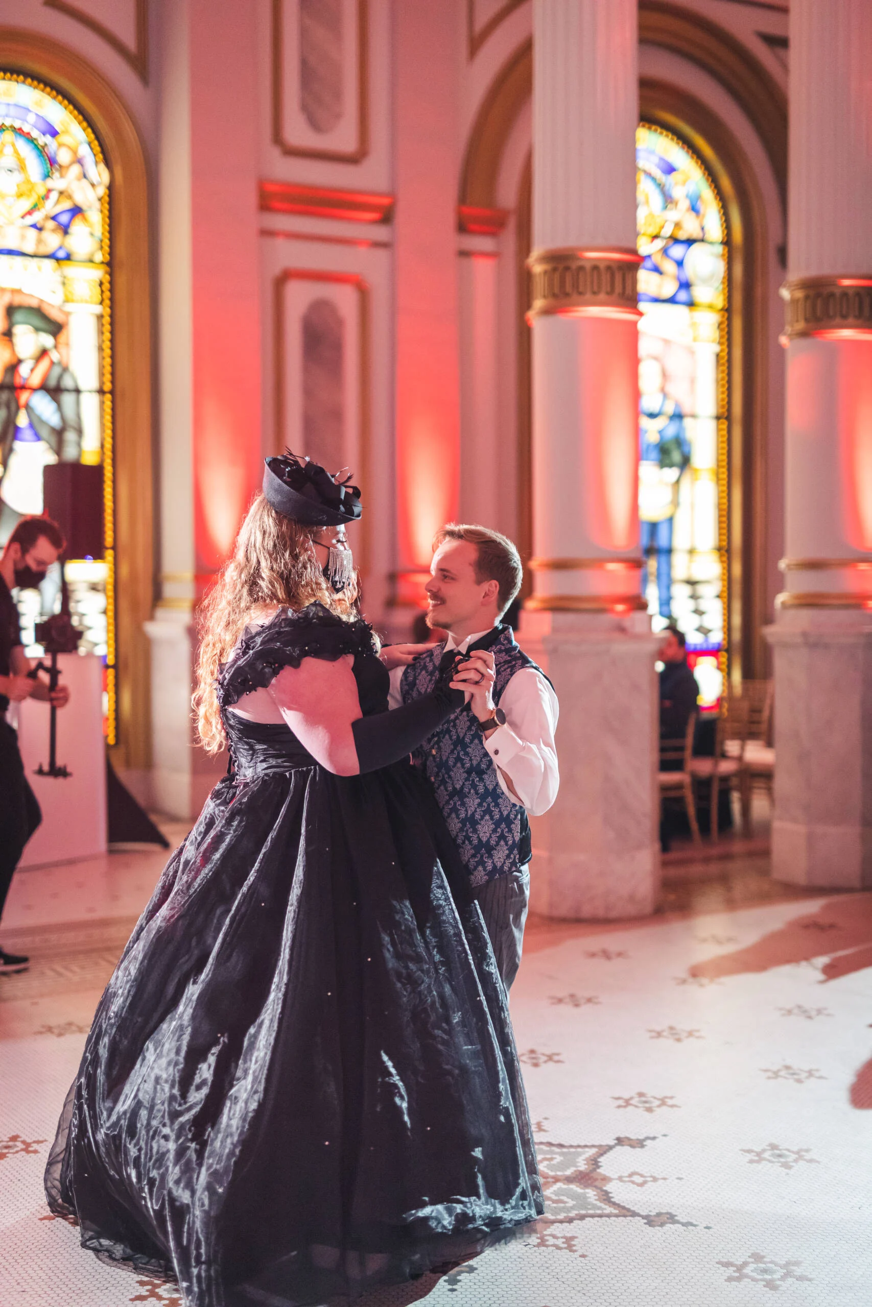 Costumechanges1-scaled Man and woman dressed in black dancing in ballroom