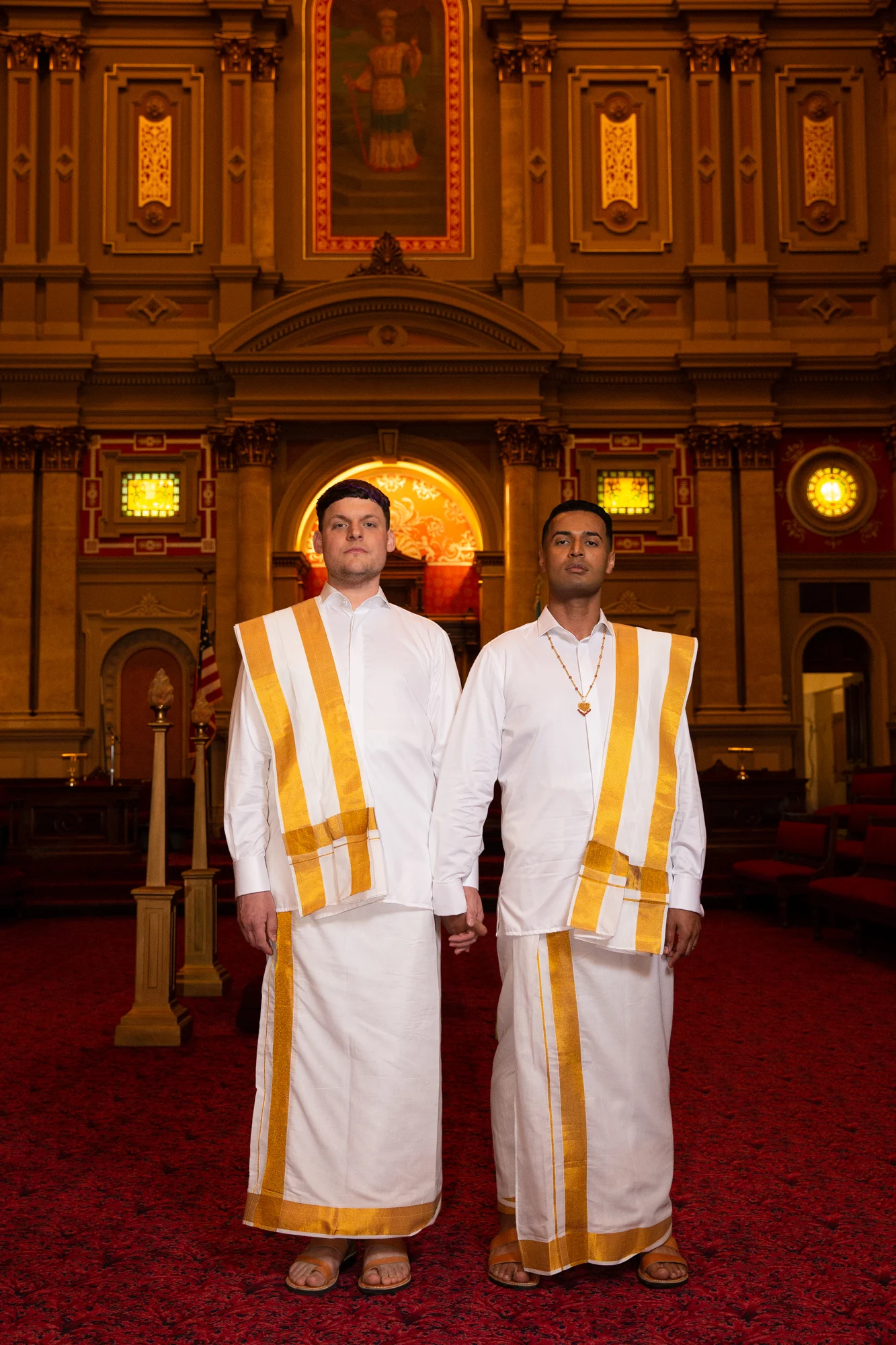 costumechange1 Grooms dressed in traditional white and yellow outfits