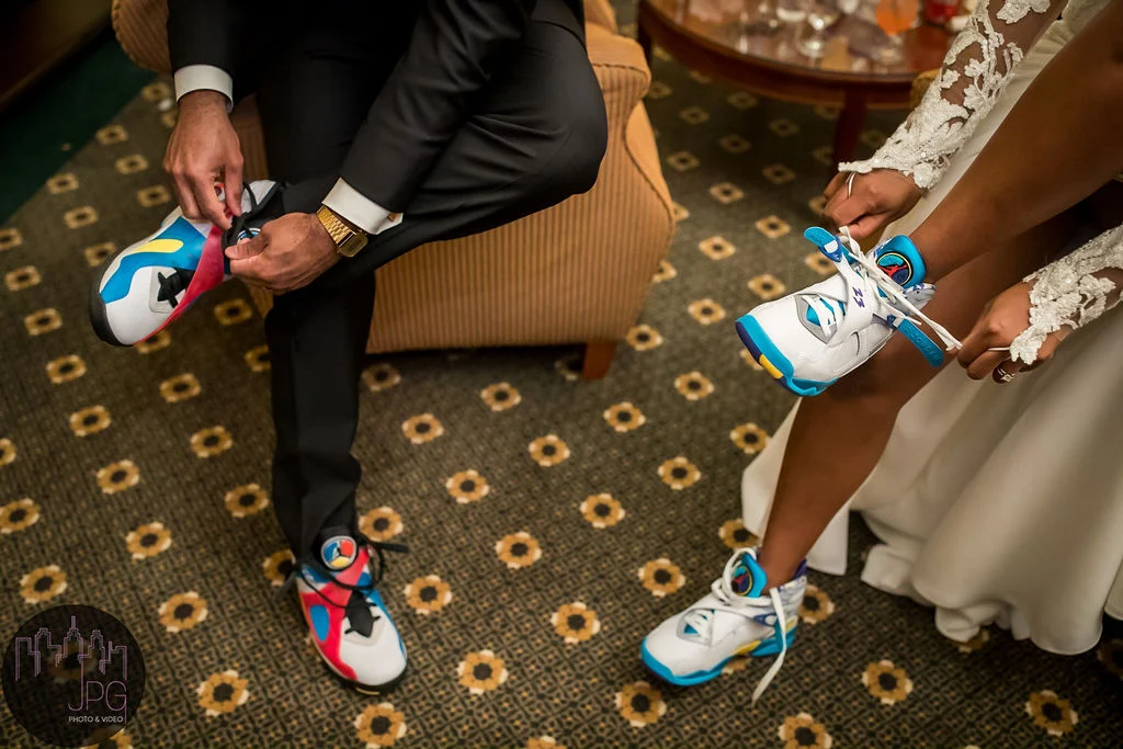 fashionforward4 Closeup of couple tying their sneakers