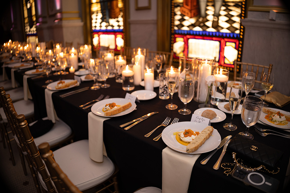 12_31_24_J_M_Wedding_-1461sm Closeup of set table with food and candles