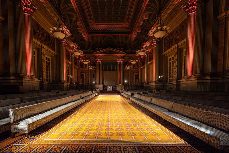 Jana Bannan Photography13 Large room with benches on either side and dramatic lighting.